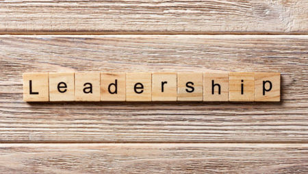 Leadership on wooden blocks