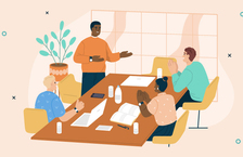 Four extroverts sitting around a table discussing ideal jobs